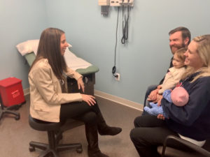 Dr. Kori Feldman with Family in Exam Room